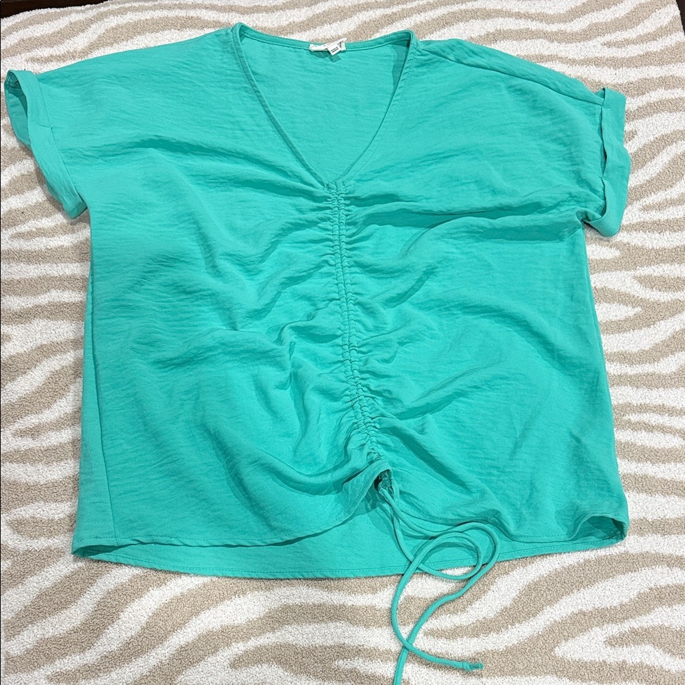 1.4.3. Story by Line Up Turquoise Ruched V-Neck Top
